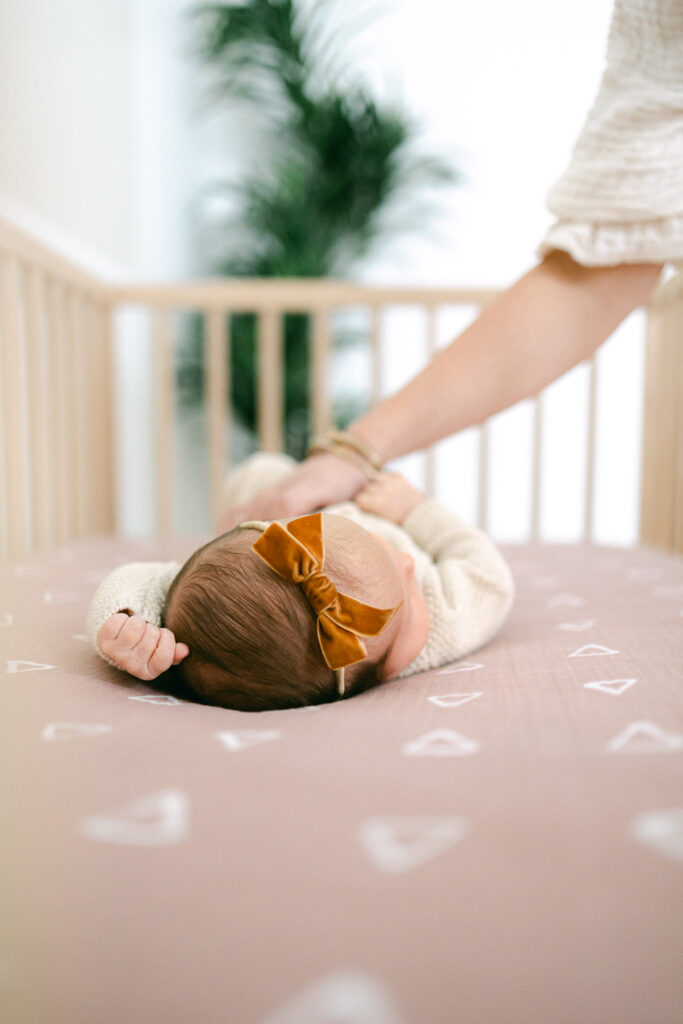 Lifestyle newborn photography at home with a family of four in Auburn. 